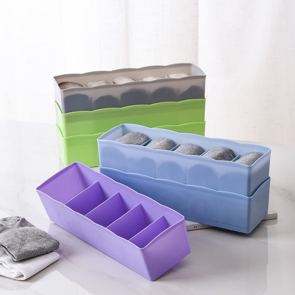 Multi-colored bead storage tray with dividers, ideal for organizing small items. Multi-colored bead storage tray with dividers, ideal for organizing small items.